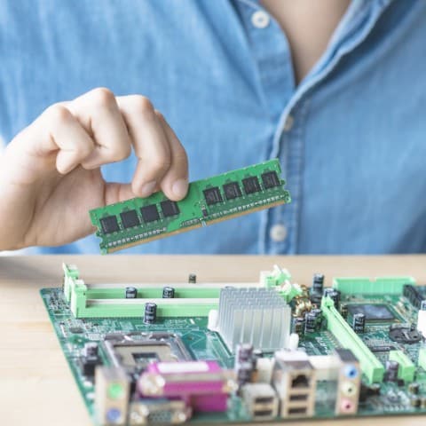 it person repairing hardware equipment s
